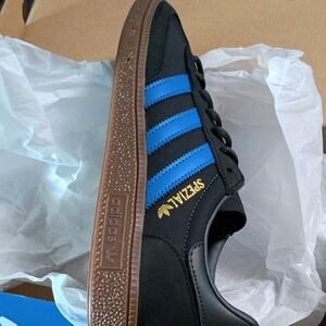 Adidas Black Sneakers with Blue Stripes